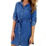 The perfect denim dress! Would look better with a wide belt that matches  the cowboy boots. Really it would look better with a wide red belt,