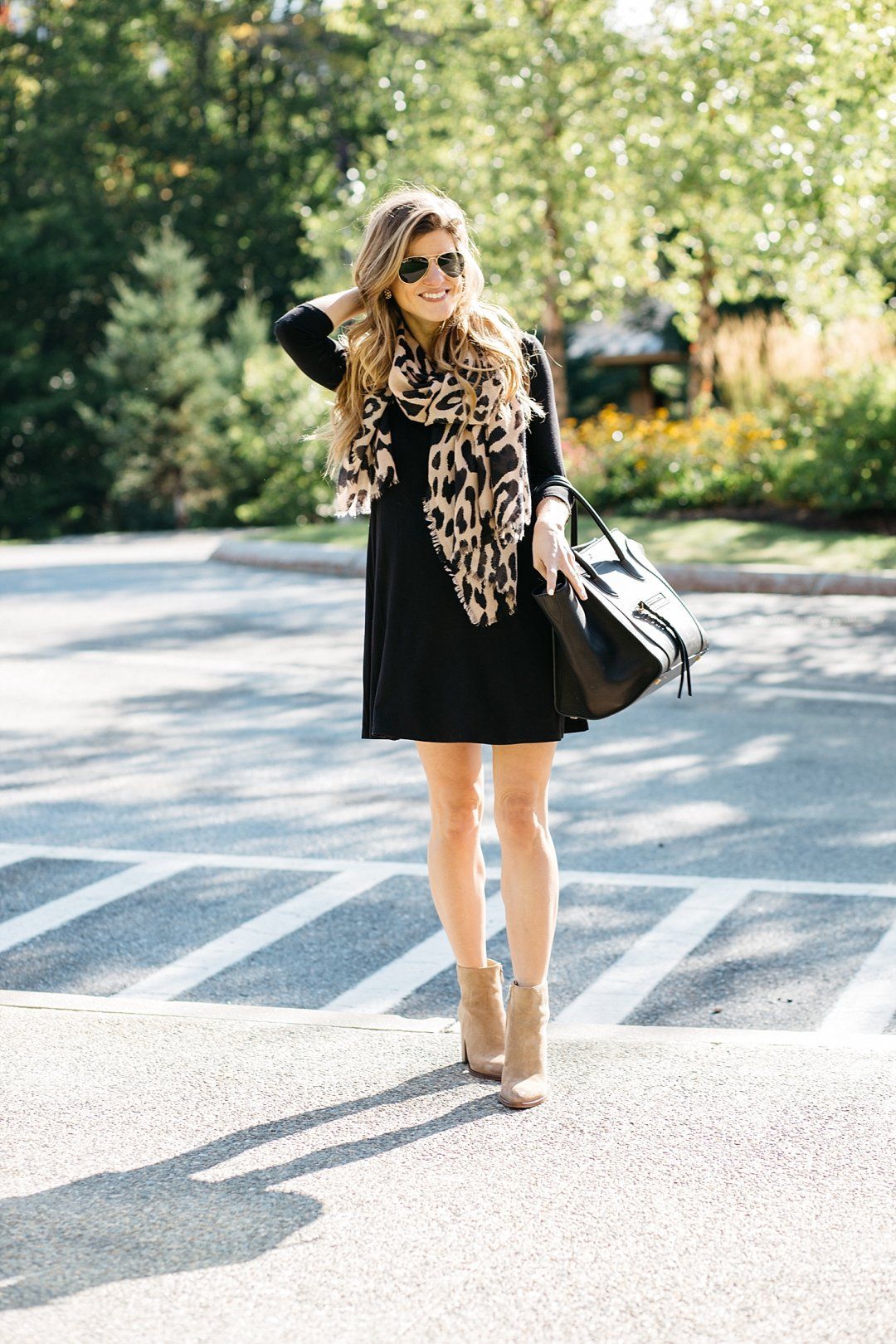 black swing dress with boots, leopard scarf, dress with ankle booties, black  dress with leopard print scarf, celine phantom tote, pointed toe suede  booties
