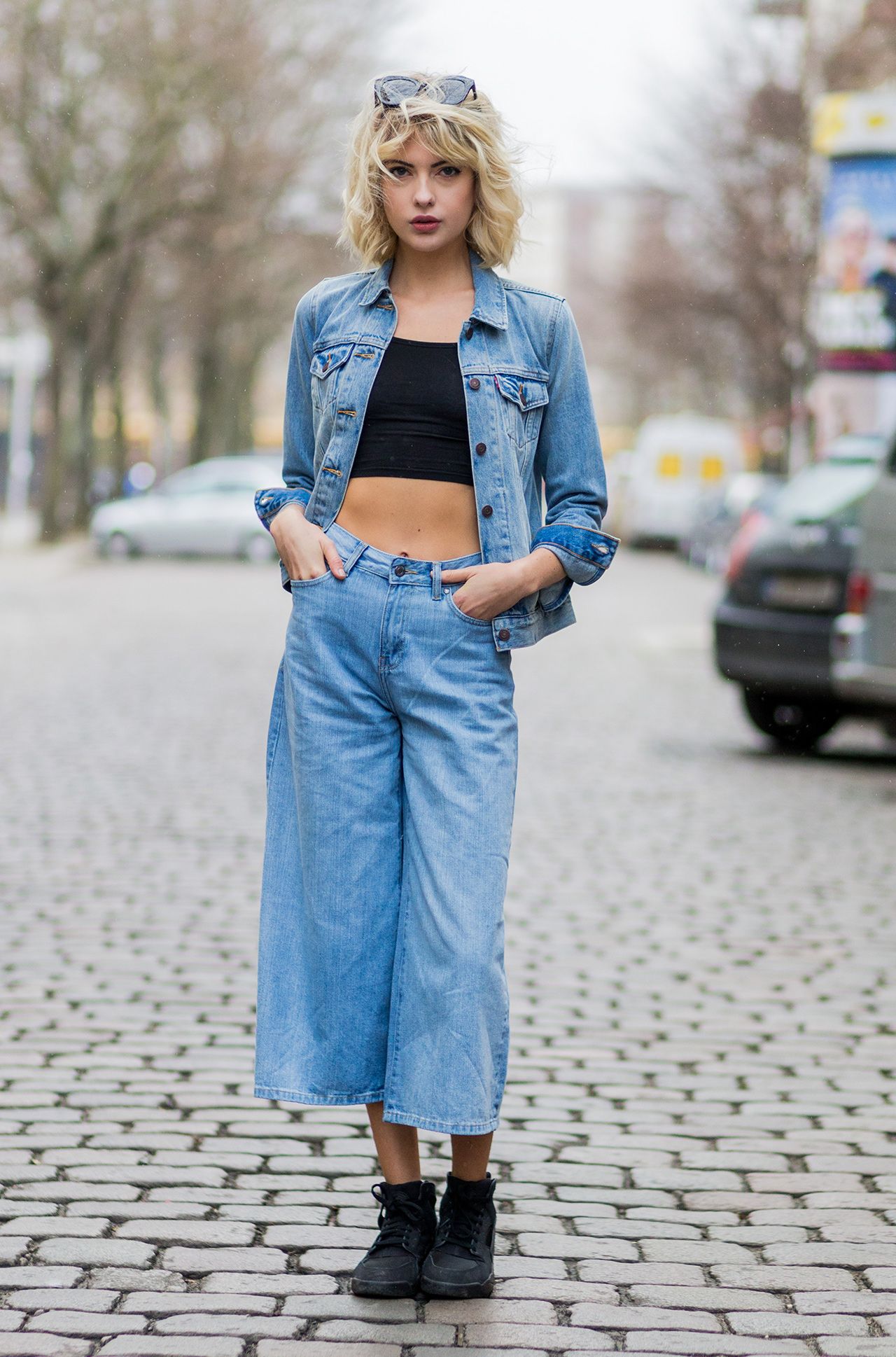 Wearing double denim has gone from rule-breaking to standard behaviour. Try  wide culottes and a classic jean jacket like this street-styler.