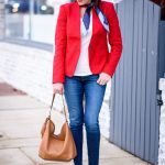 Sharing how to style a red blazer with jeans and a neck scarf. I love