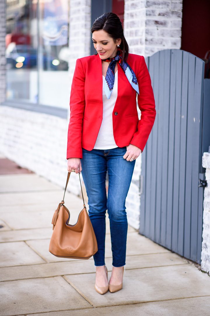Sharing how to style a red blazer with jeans and a neck scarf. I love