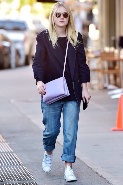 Super baggy boyfriend jeans can still pack a punch in the wardrobe  department, especially when you style them out like Dakota Fanning did on  recent trip out