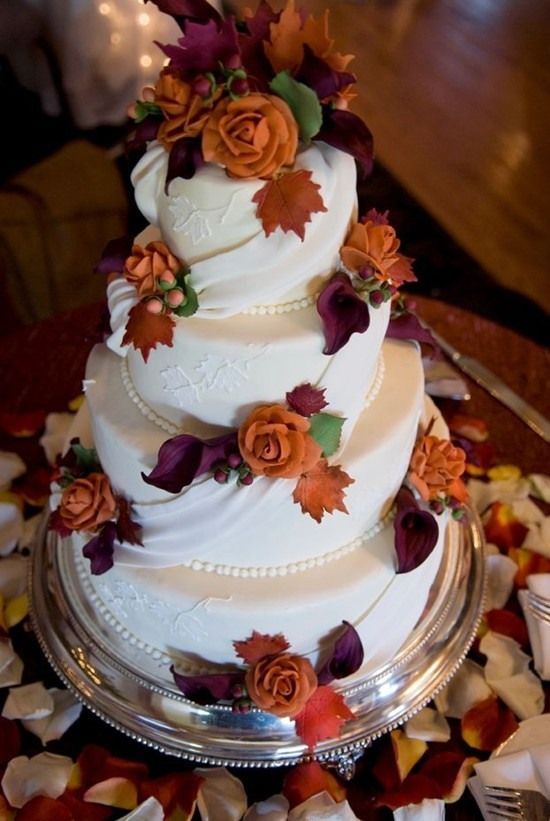 fall wedding cake purple and orange. trade the roses for something else,  though!