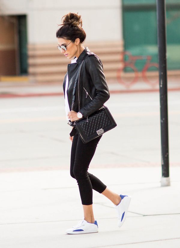Christine Andrew keeps it casual in this outfit consisting of a leather  jacket, cropped leggings