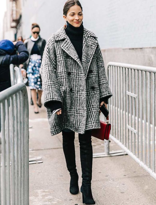 A delightfully oversized coat with cropped sleeves.