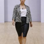 A model walks the runway at the British Plus-size Fashion Weekend show  during London