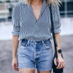 Jill Lansky of the August Diaries wearing denim cut-off shorts and striped  blouse