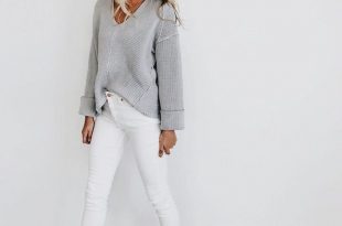 Casual outfit. White jeans and oversized sweater