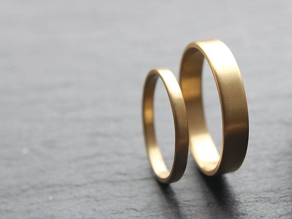 2mm + 4mm wedding ring set for him and her, in recycled 18ct yellow gold, featuring flat profile and brushed finish – made to order