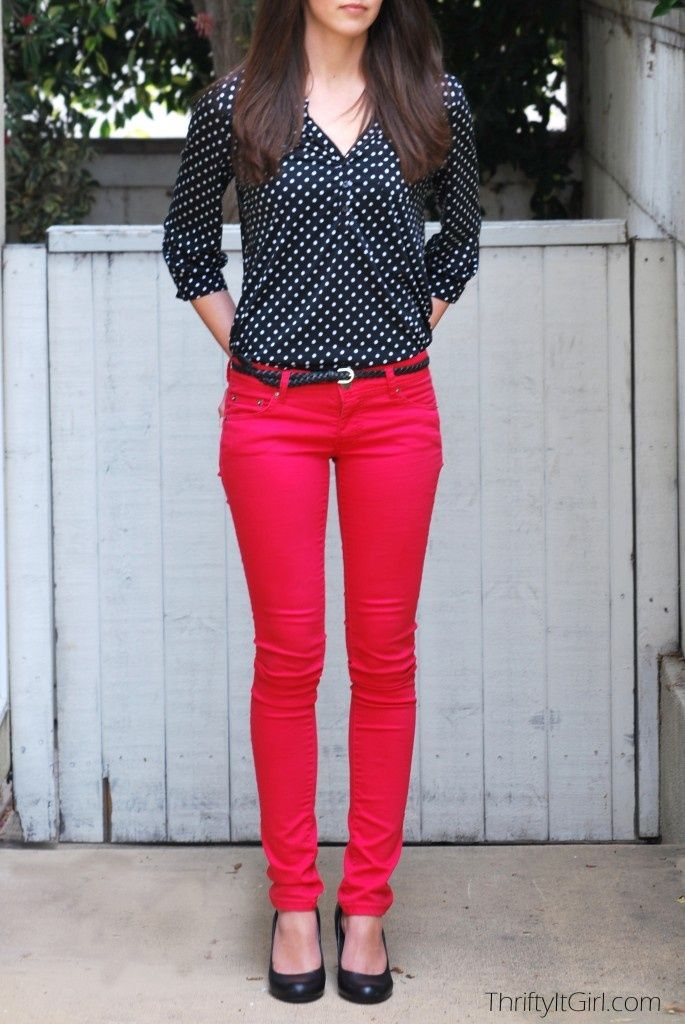 Black polka dot shirt, red jeans