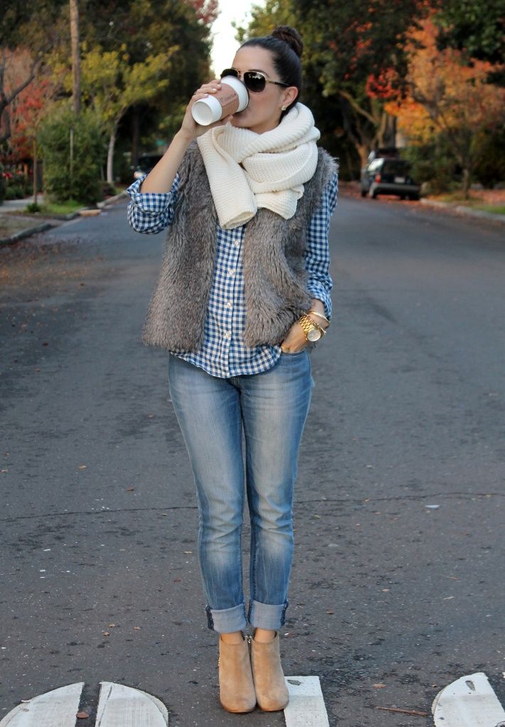 Team a grey fur vest with blue slim jeans to create a chic, glamorous look. Elev…