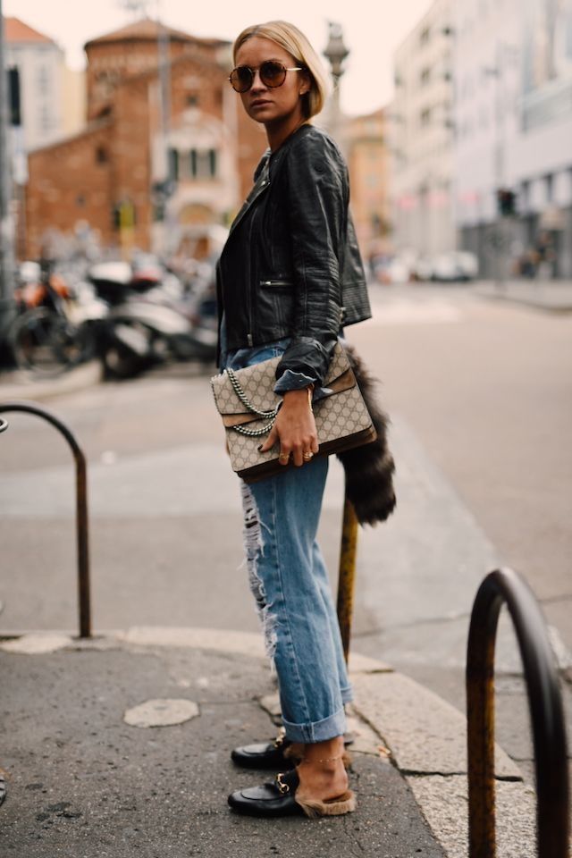 black leather jacket with ripped jeans and marvelous leather loafers